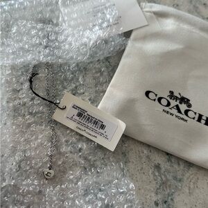 Brand new Coach necklace